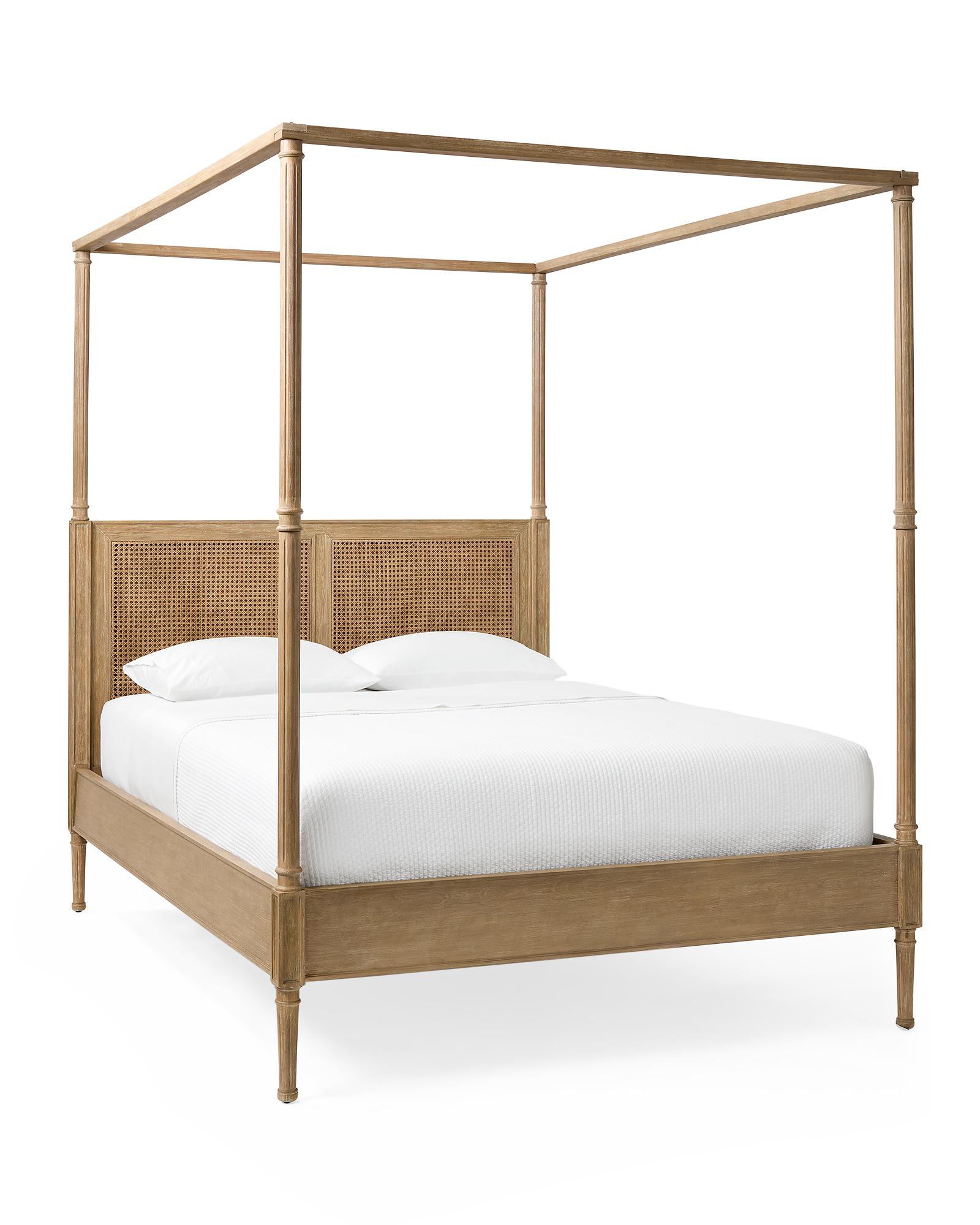 Four-poster bed in light oak with woven cane headboard panels
